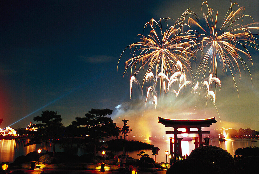 Fireworks above the lake at Epcot Center at night, Disneyworld, Orlando, Florida, USA, America