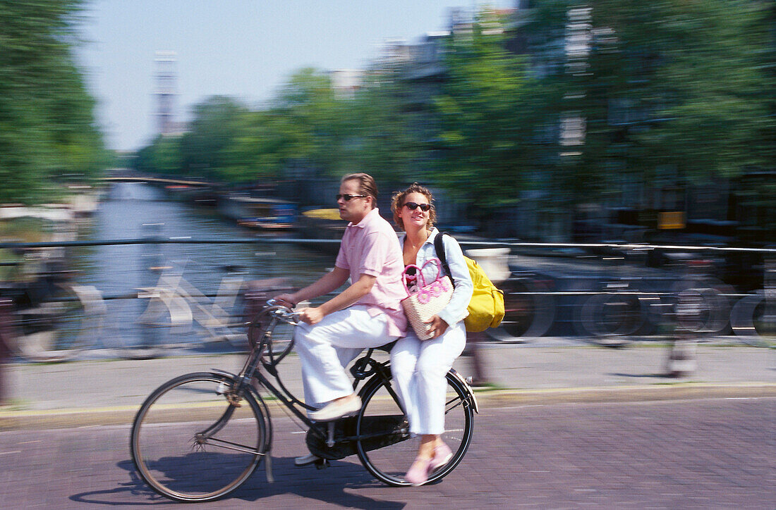 Couple on the move, Prinsengracht, Amsterdam Netherland