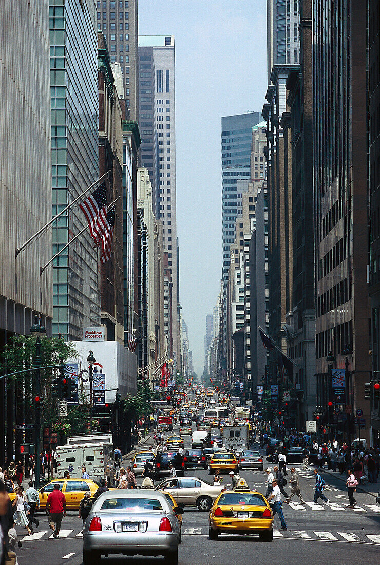 Cars and people on Madison Avenue, Manhattan, New York, USA, America