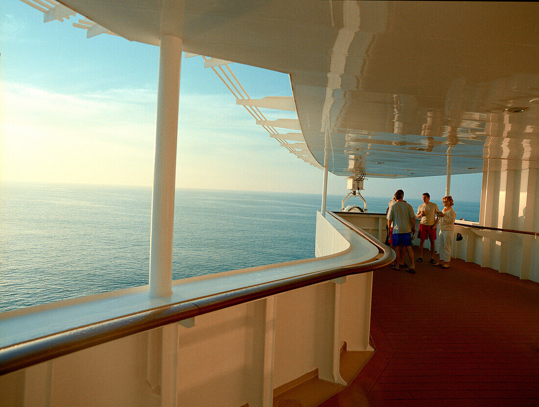 Group of people on the promenade deck, Queen Mary 2, Cruise Ship