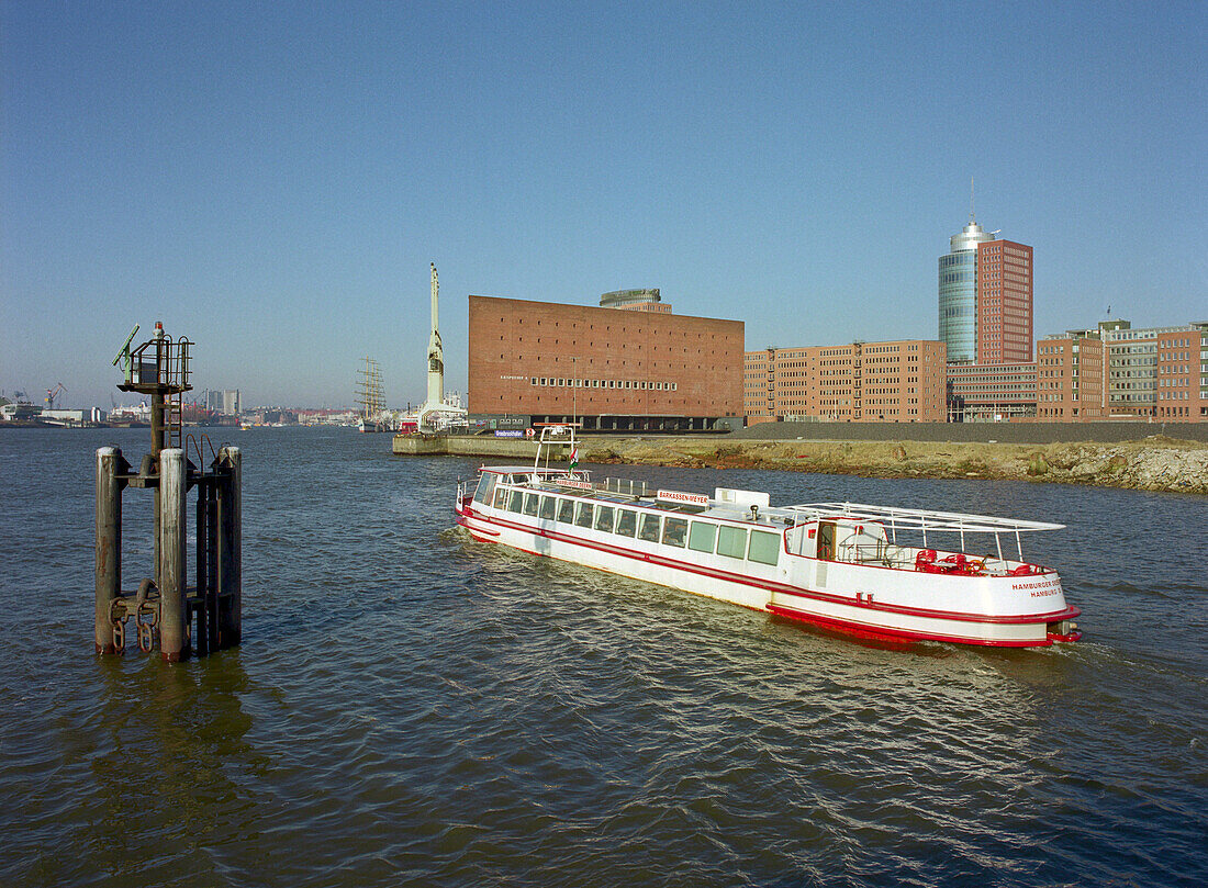 Tour boat in front of Hanseatic Trade Center, Kaispeicher A, Port of Hamburg, Hamburg, Germany