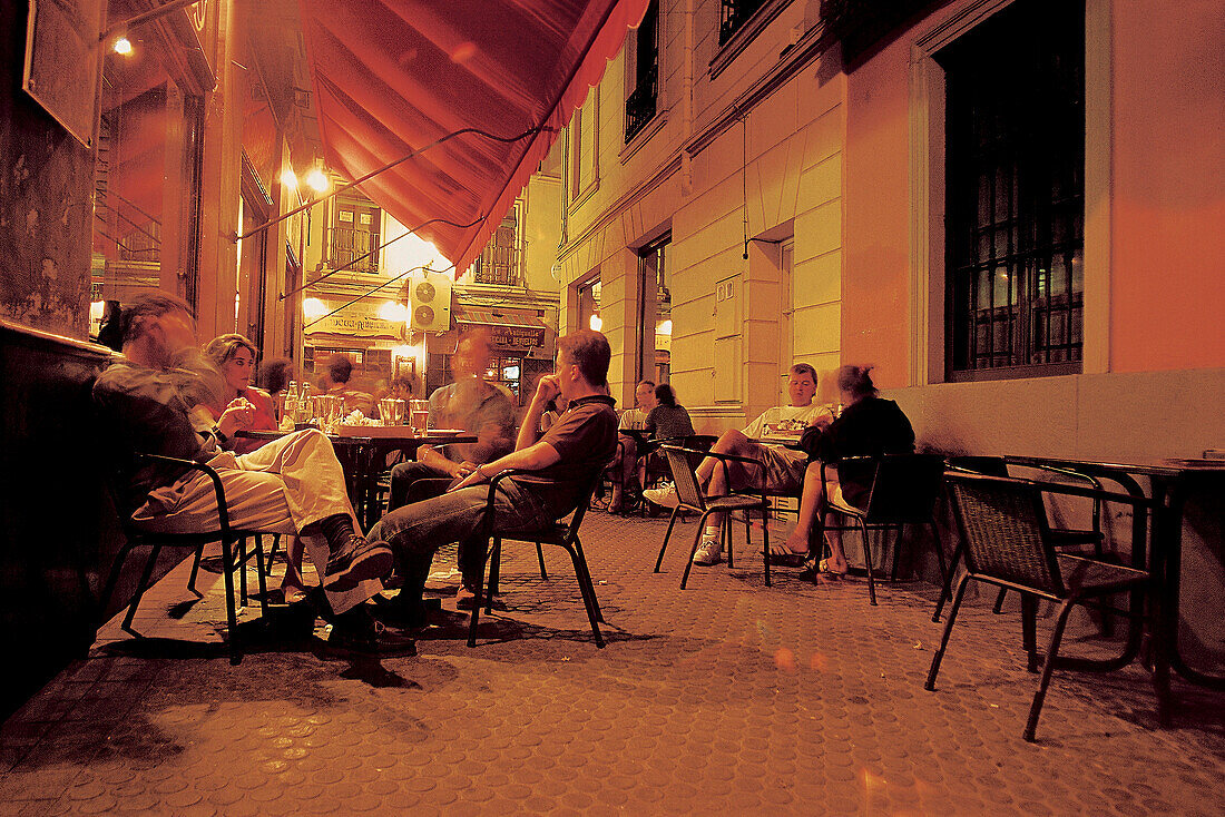 People at a sidewalk cafe in the evening, Andalusia, Spain, Europe