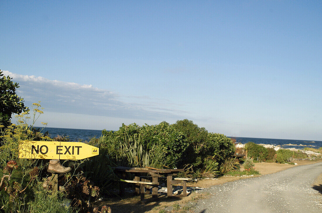 Sign on street, landscape bay