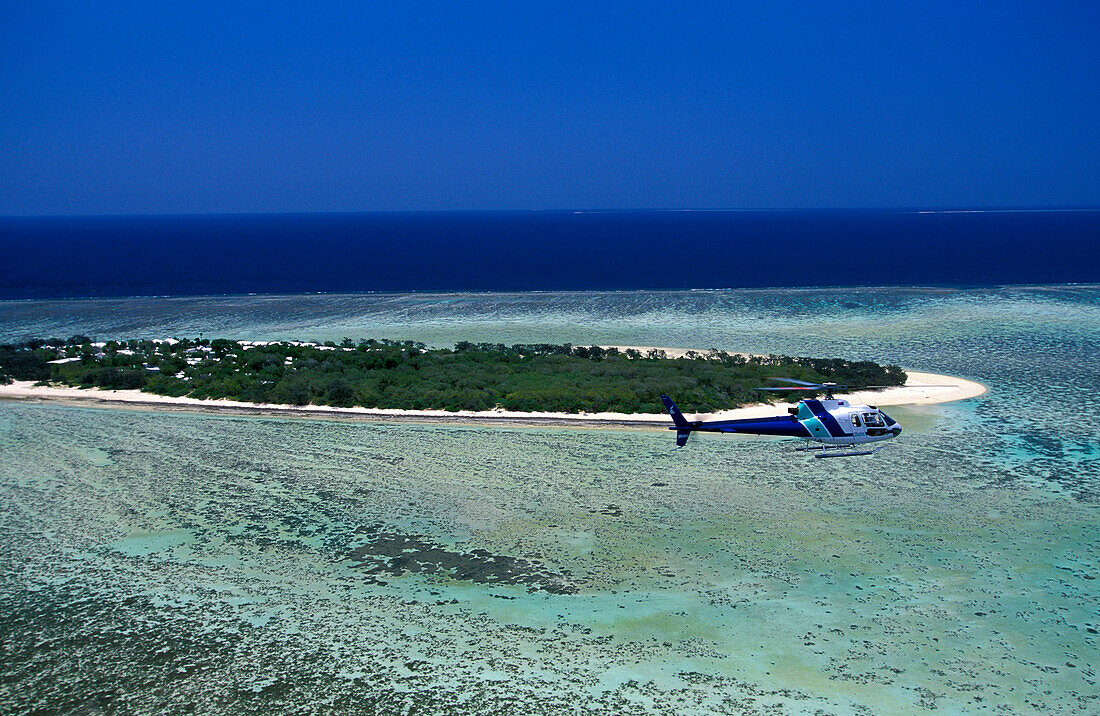 Helicopter in front of island, Heron Island, Great Barrier Reef Queensland, Australia