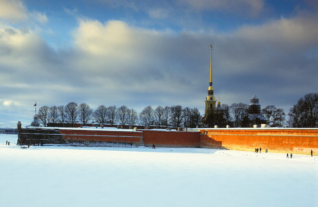 Peter and Paul Cathedral inside Peter and Paul Fortress, Frozen river in the foreground, St. Petersburg, Russia