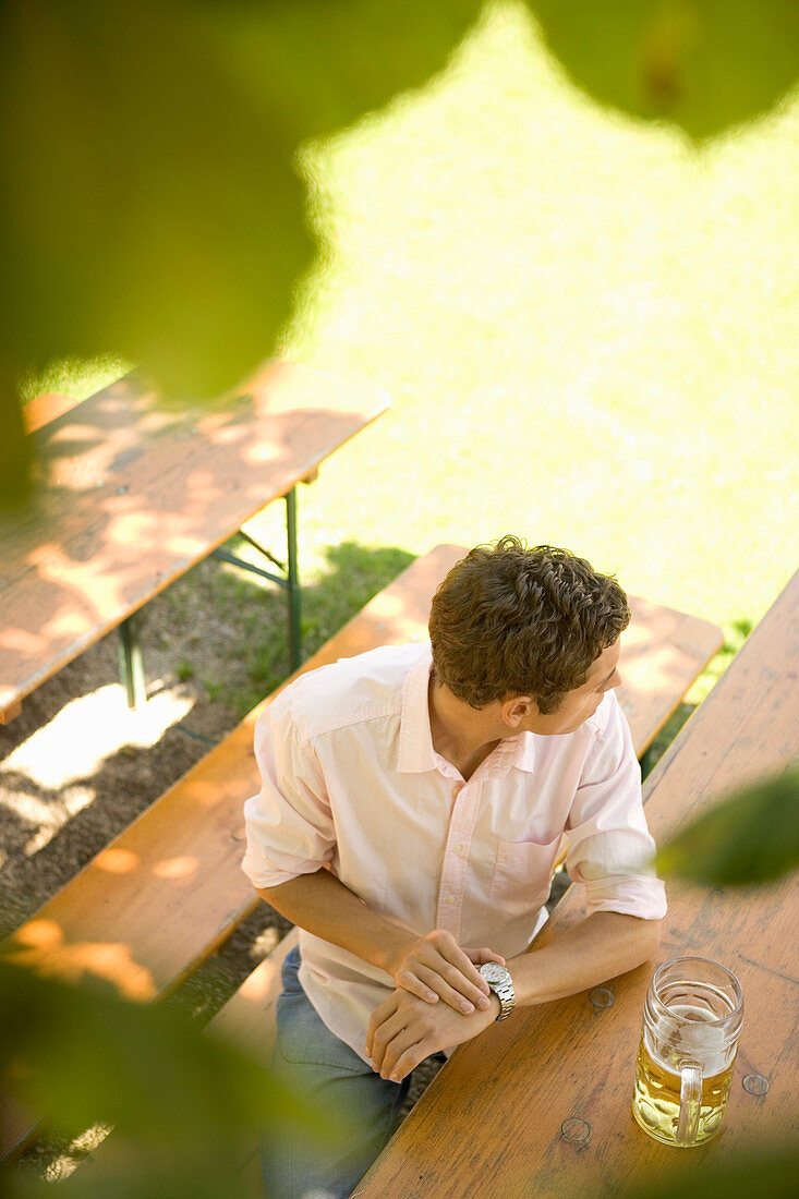 Man in beergarden, Starnberger See Bavaria, Germany