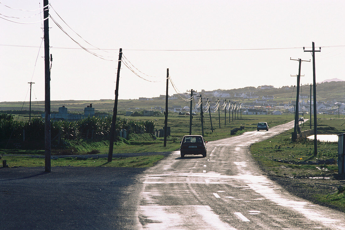 Cars on a county road, Achill Island, County Mayo, Ireland, Europe