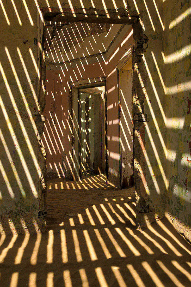 Abandoned house full of sand, Former mining village, now a ghost town, Kolmanskop, Namibia, Africa