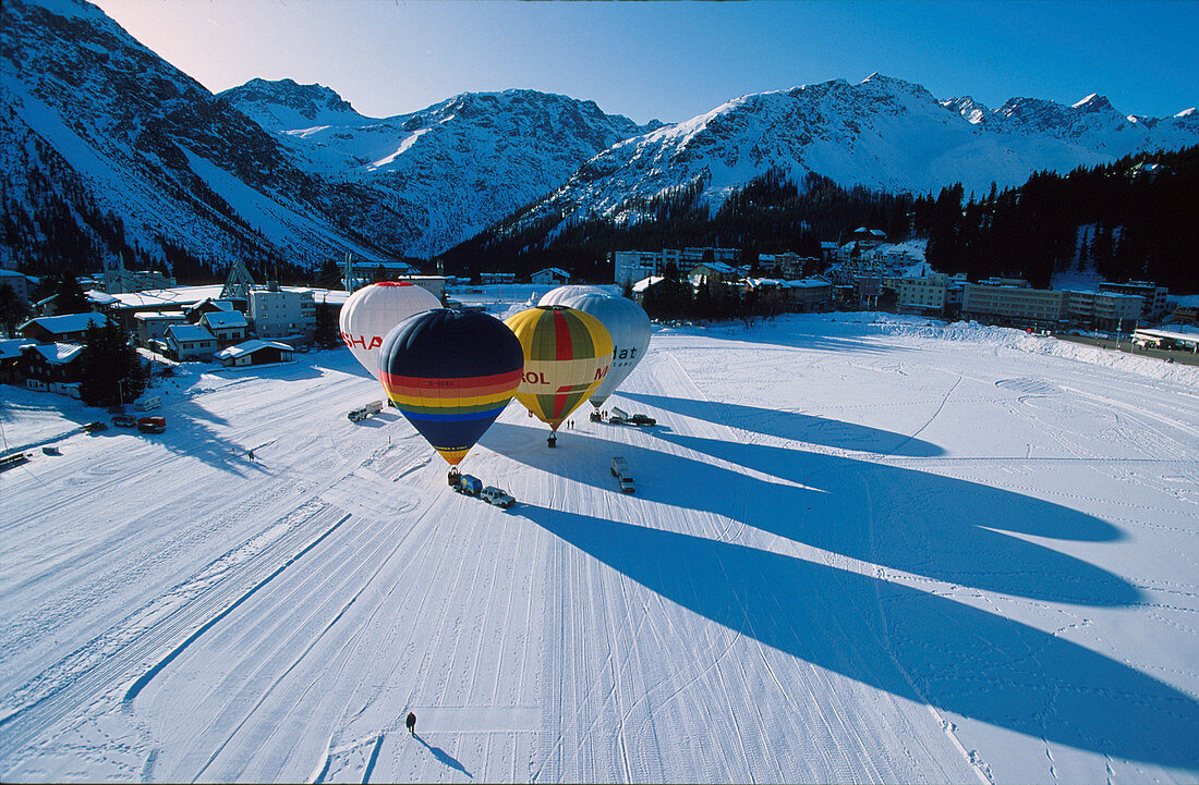 Hot-air balloons at the start, Lake Arosa, Arosa, Grisons, Switzerland