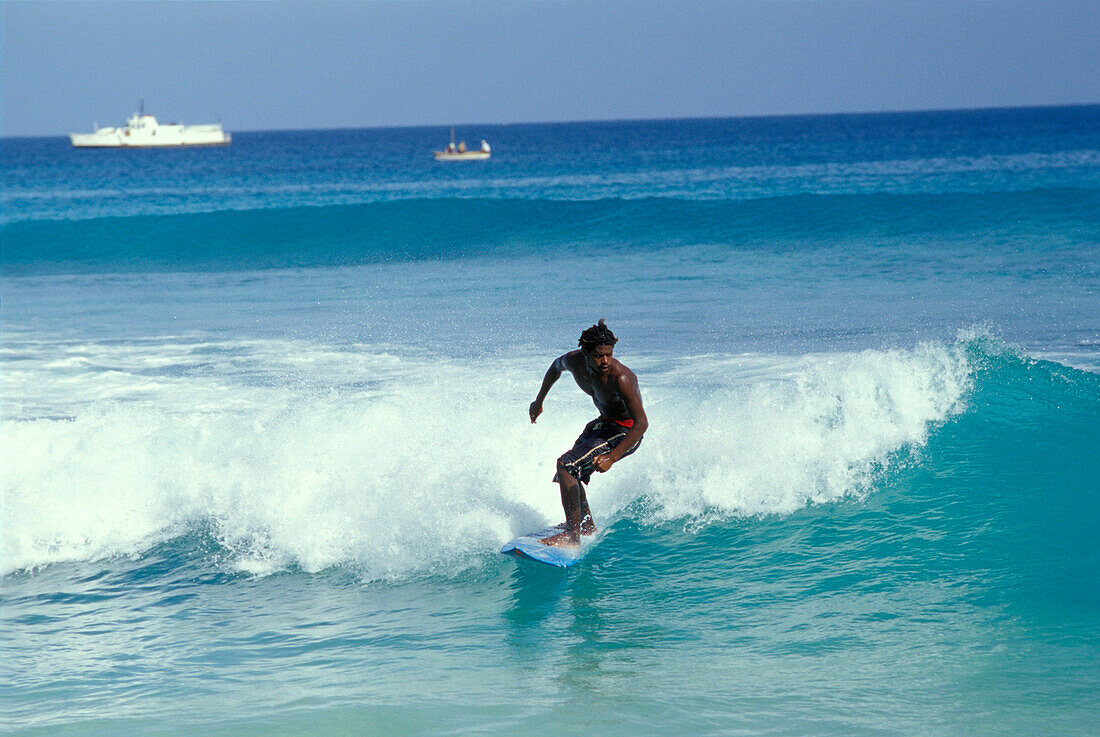 Surfing at beach of Santa Maria, Sal, Cape Verde Islands, Africa
