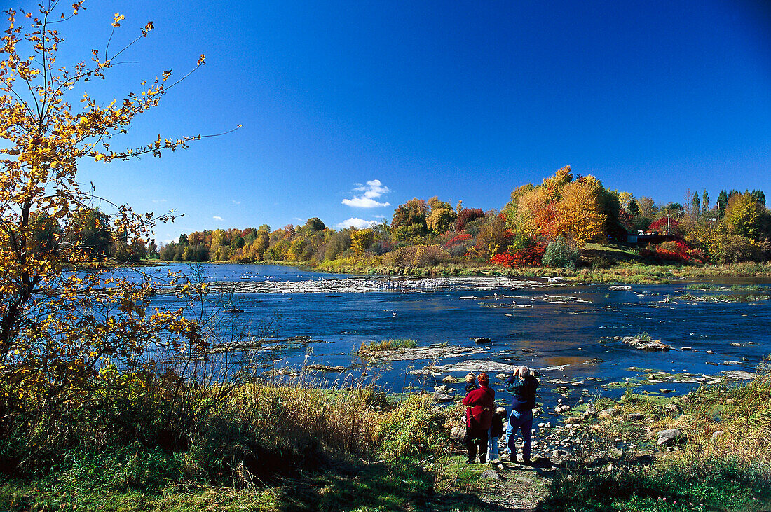 Family on the river, P. Quebec Canada