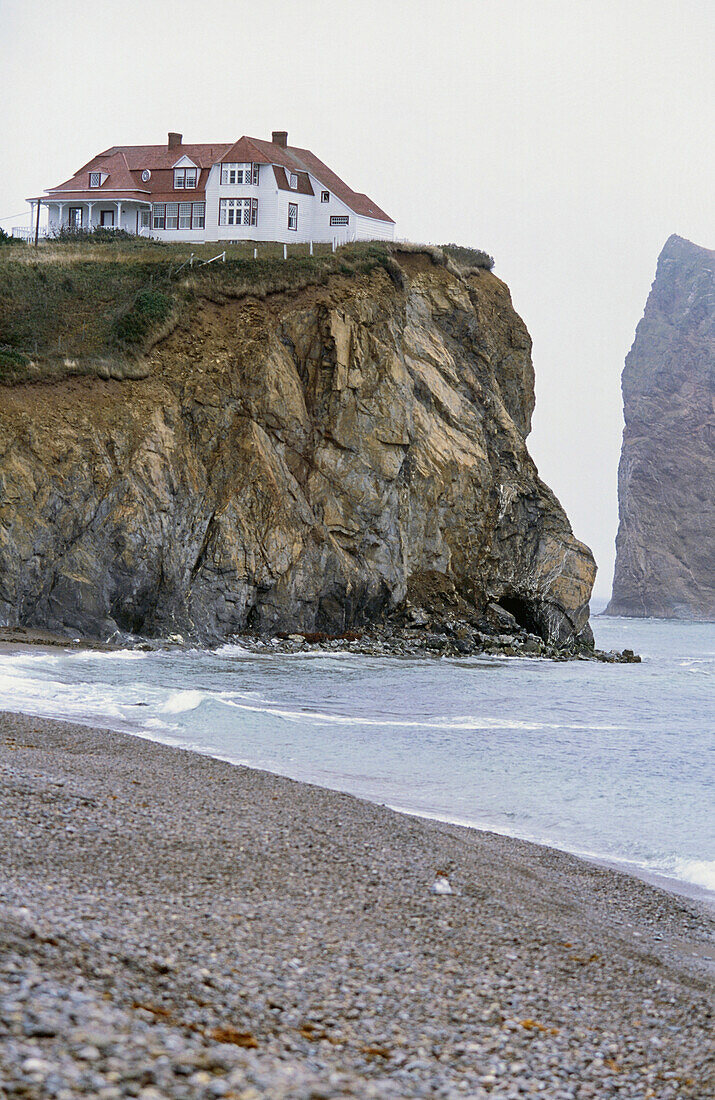 Lonesome mansion on a steep coast, Perce, Gaspesie, Quebec, Canada