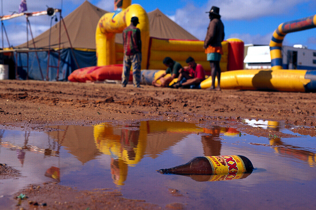 Fred Brophy's Boxing Troupe, camp after rain, Boulia, Simpson Desert, Queensland, Australia