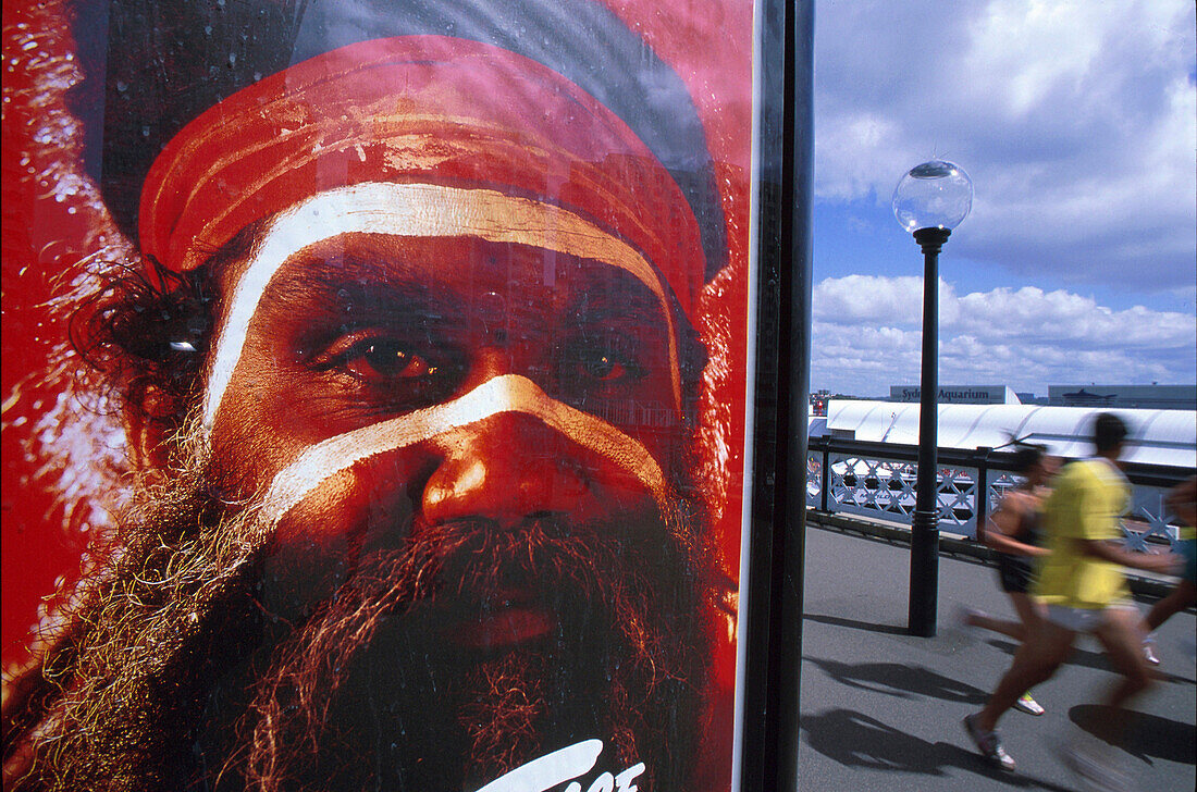 Billboard and joggers, Sydney, New South Wales, Australia