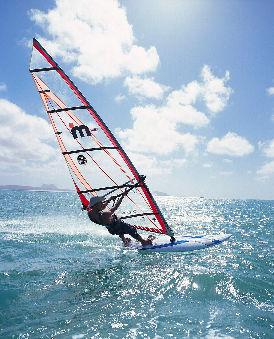 A sail boarder on the sea in the sunlight, Boa Vista, Cape Verde, Africa