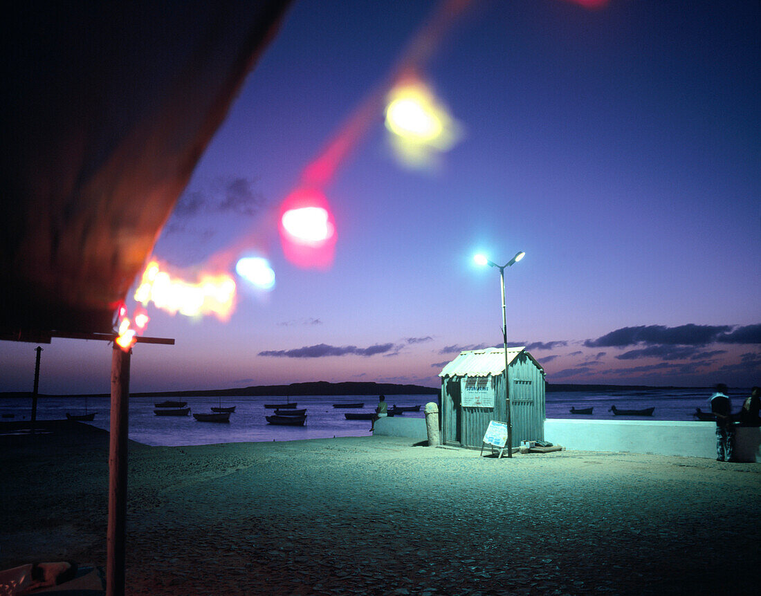 Bar with set of lights at the old pier, Twilight, Sal Rei, Boa Vista, Cape Verde Islands