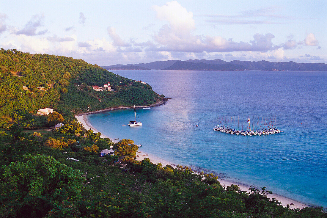 Boats in a bay under clouded sky, White Bay, Jost van Dyke, British Virgin Islands, Caribbean, America