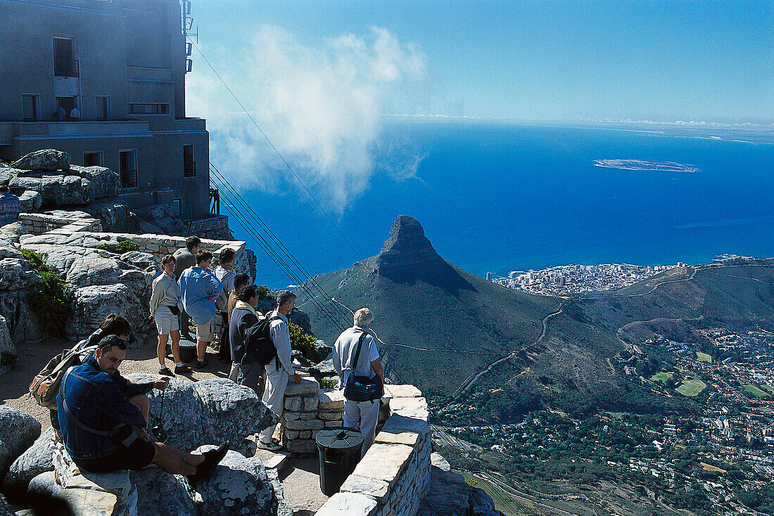 Tourists looking at the view from the table mountain, Lionshead, Capetowm, South Africa, Africa