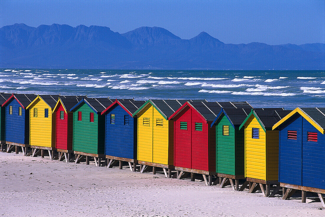 Colourful wooden beach huts along the beach, Muizenberg, South Africa