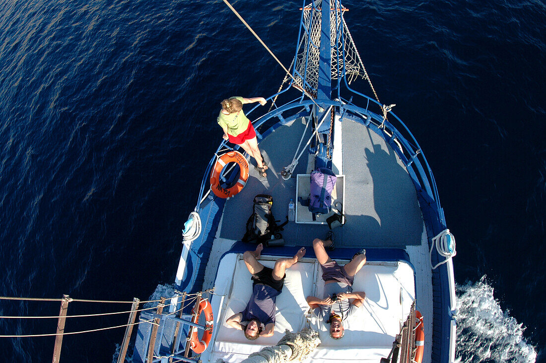Relaxing on sailing boat, Kalymnos, Greece