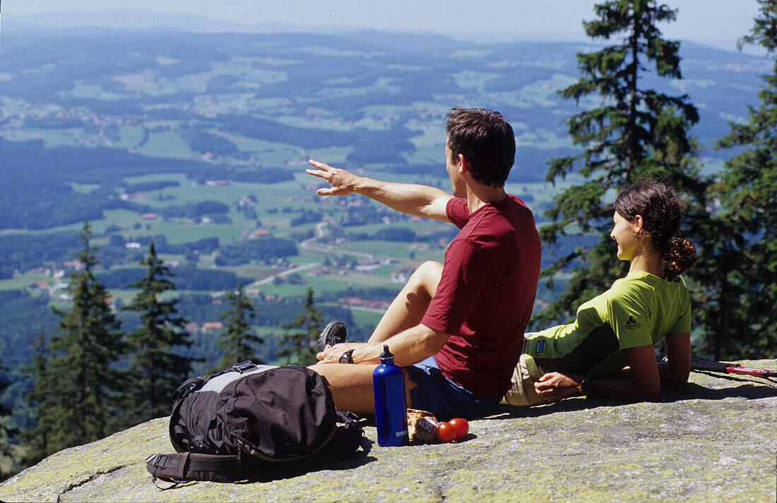 Hikers having wide view over Muehlviertel, Muehlviertel, Upper Austria