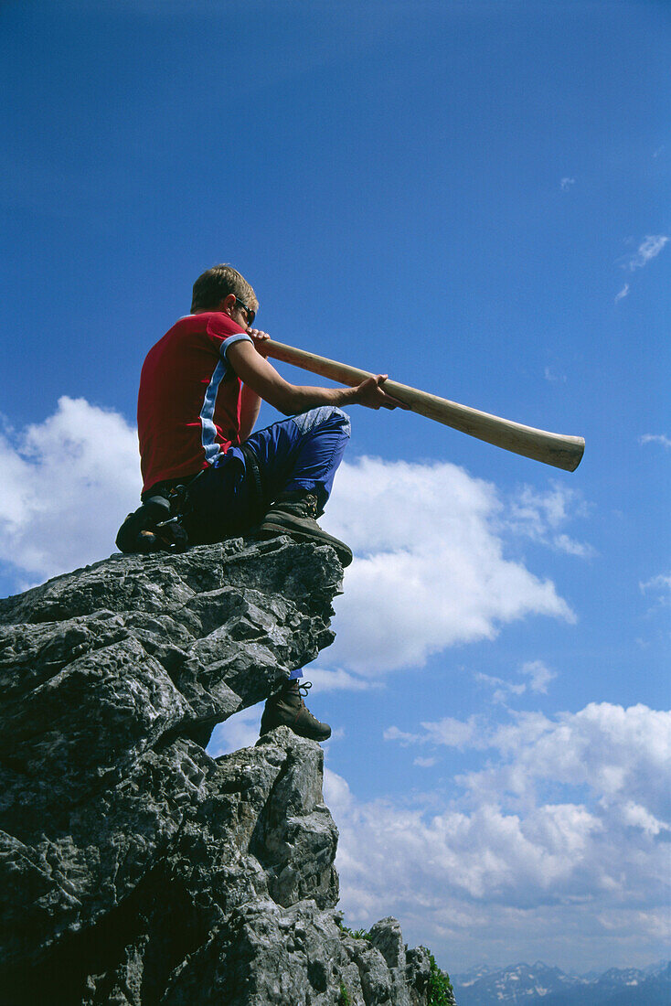 Man playing a Didgeridoo, Salzburger Land, Austria