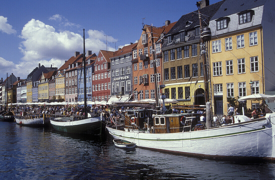 Houses and boats at Nyhavn harbour, Copenhagen, Denmark, Europe