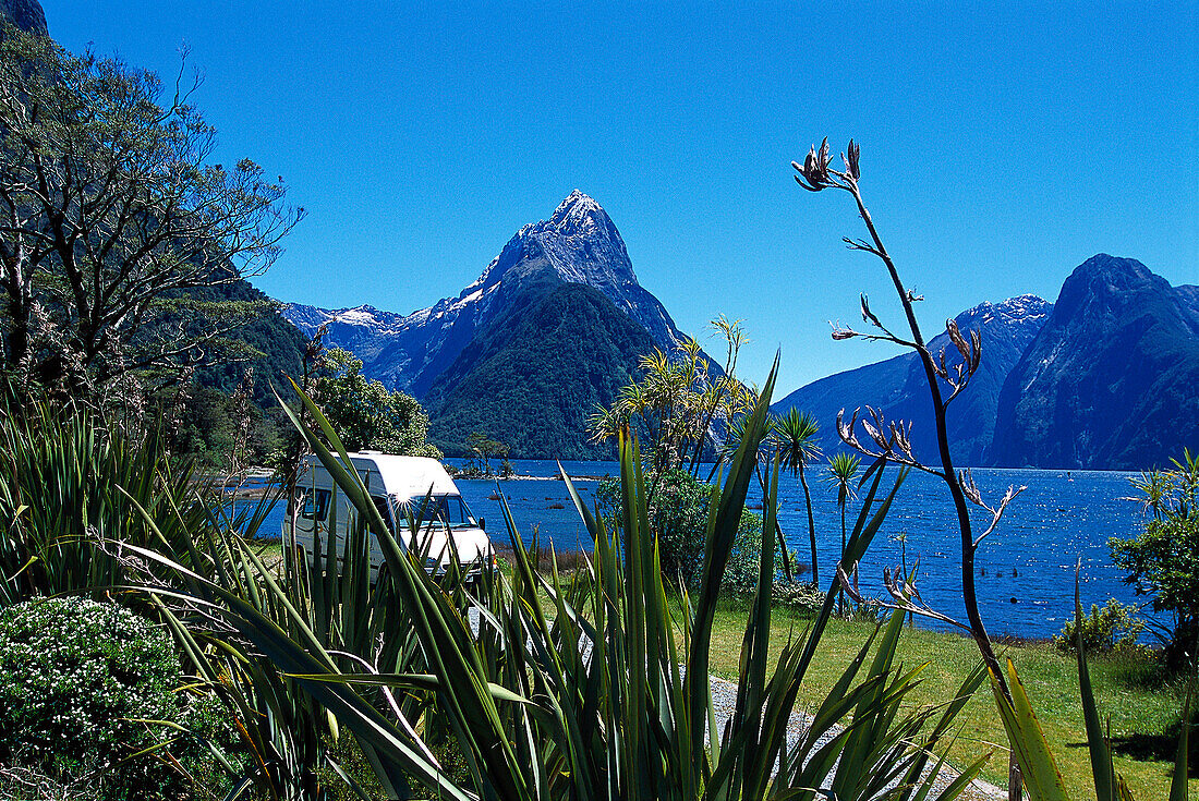 Maui Spirit, Camper van at Milford Sound, Fiordland National park, Te Wahipounamu World Heritage site, South Island, New Zealand