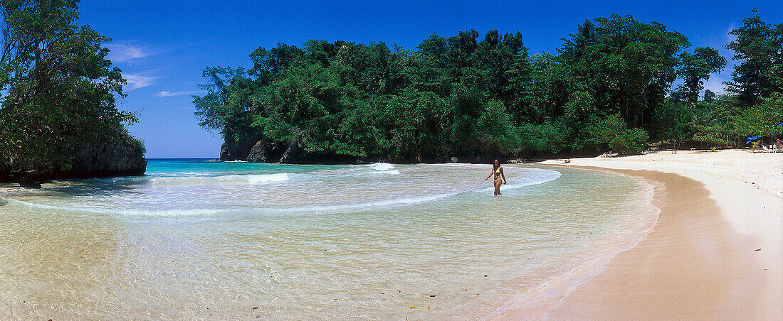 Woman Strolls along Beach at Frenchman' s Cove, near Port Antonio, Jamaica, Caribbean