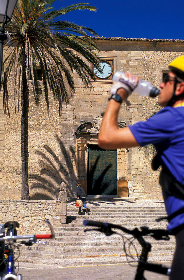 Biker, drinking, Montuiri, Majorca Balearic Islands, Spain