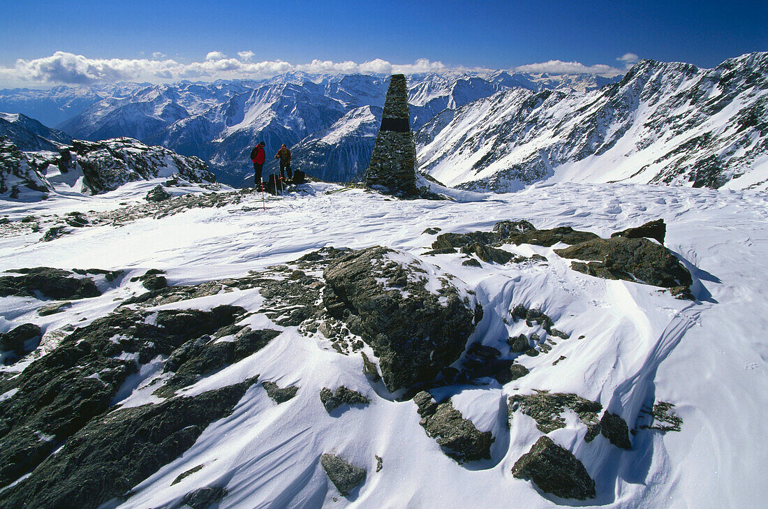 Two people on finding place of the Similaun man well-preserved mummy from stone age, , Oetztaler Alpen, South Tyrol, Italy