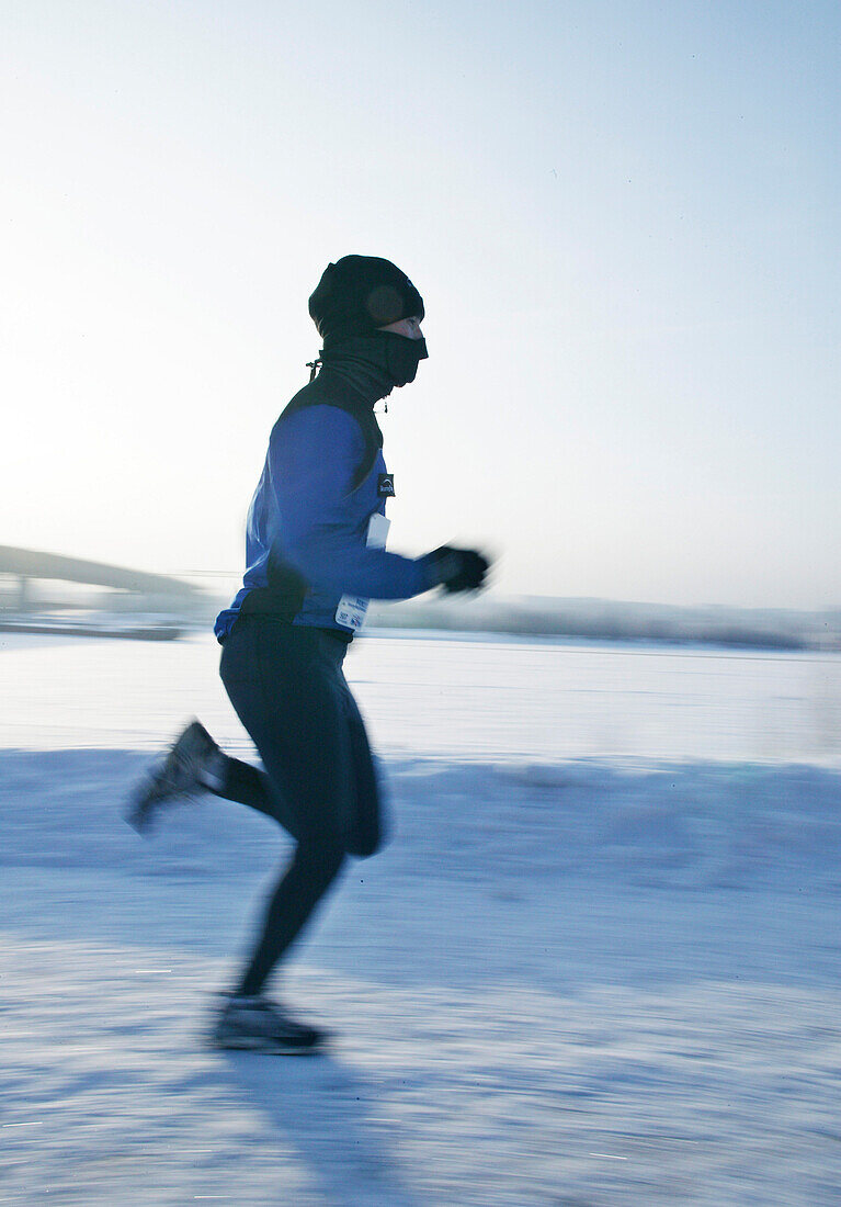 Runner at Ice Marathon in Omsk, Sibiria, Russia