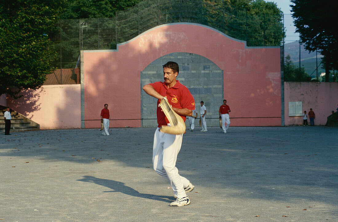 Men having a game of pelota, Cambo-les-Bains, Pays Basque, France