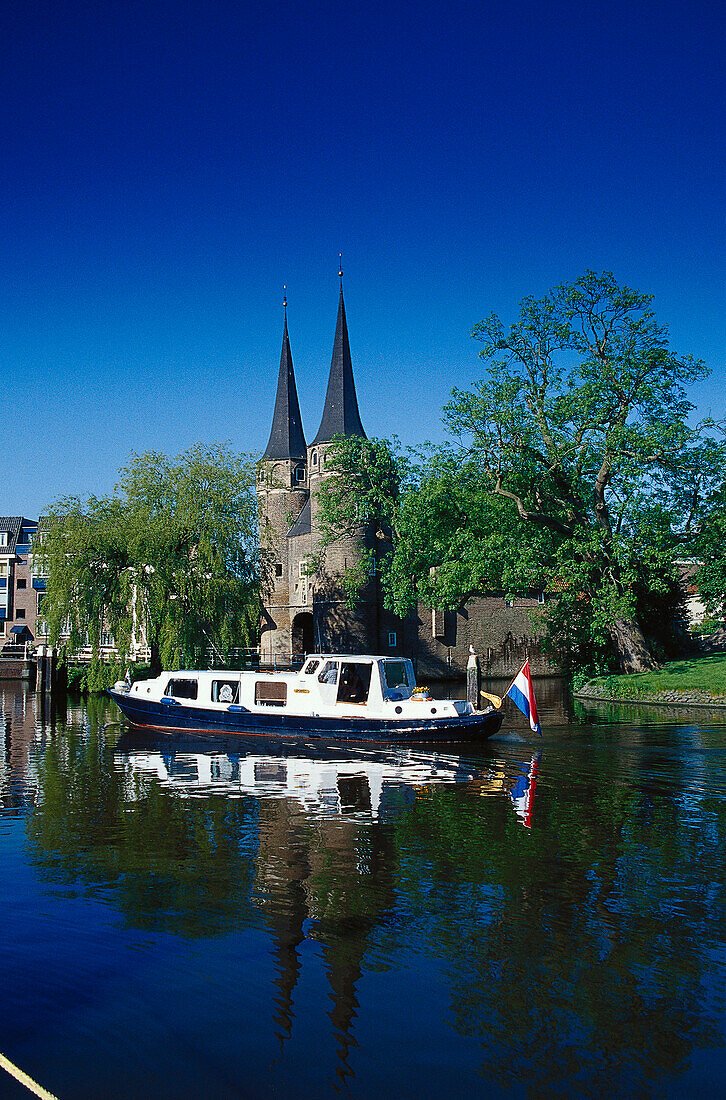 Barge on the canal near the city gates, Delft, Netherlands