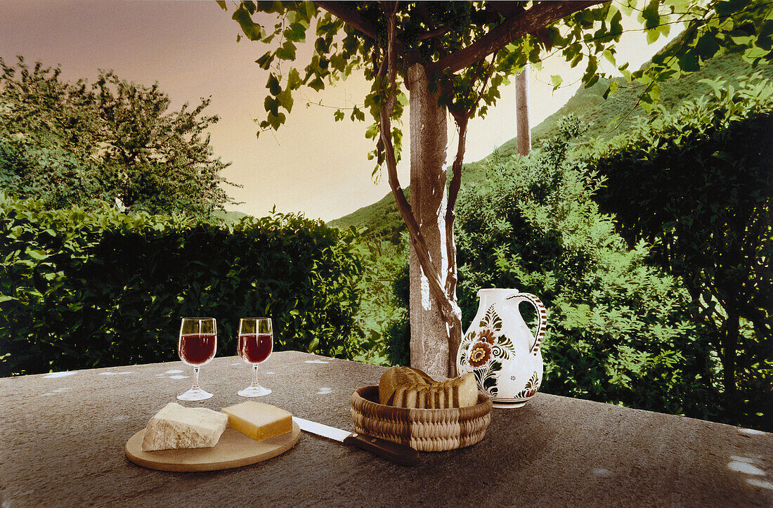 Still life with red wine, bread and cheese, Ticino, Switzerland