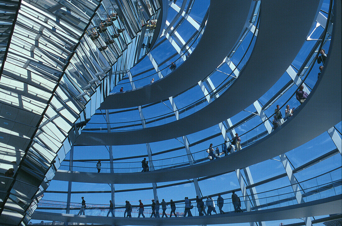 Reichstag, visitors inside glass dome, low angle view, Berlin, Germany