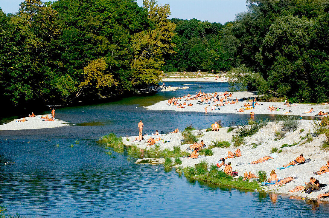 People sunbathing nude at the banks of the river Isar, Flaucher, Munich, Bavaria, Germany, Europe