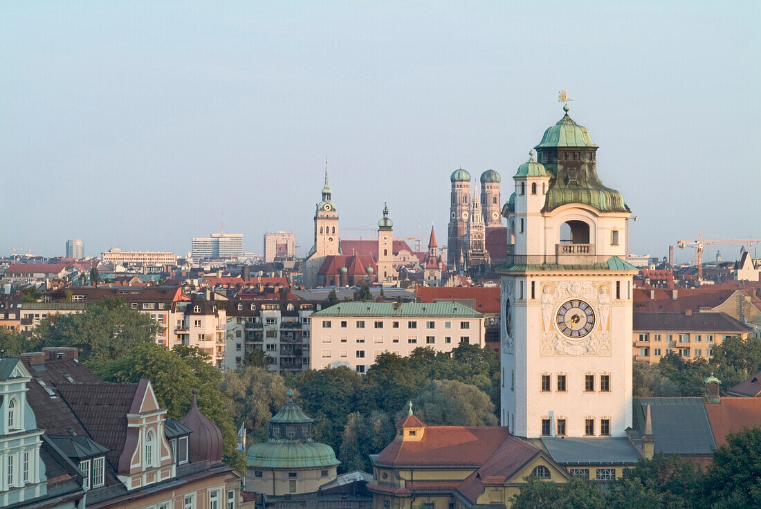 Munich Skyline with Muellersches Volksbad and Twin Towers of Frauenkirche, Munich, Bavaria, Germany