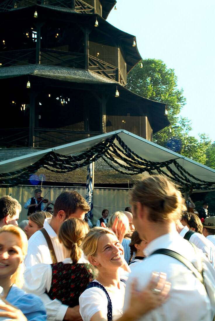 Kocherl-Ball, Traditional Bavarian Dance in beergarden, Chinisischer Turm, English Garden, Munich, Bavaria, Germany