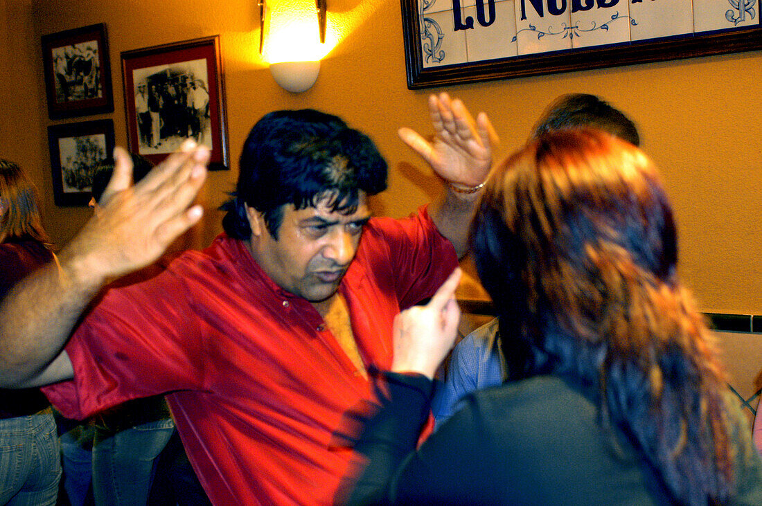 A couple dancing Flamenco at a pub, Triana, Seville, Andalusia, Spain, Europe