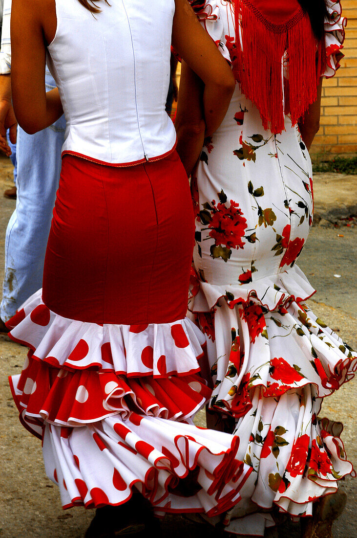 Women wearing Flamenco dresses, Seville, Andalucia, Spain, Europe