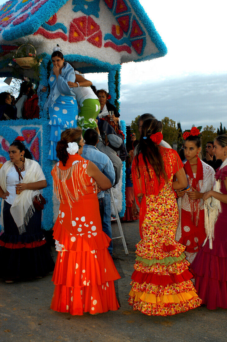 Women wearing Flamenco dresses, Seville, Andalusia, Spain, Europe