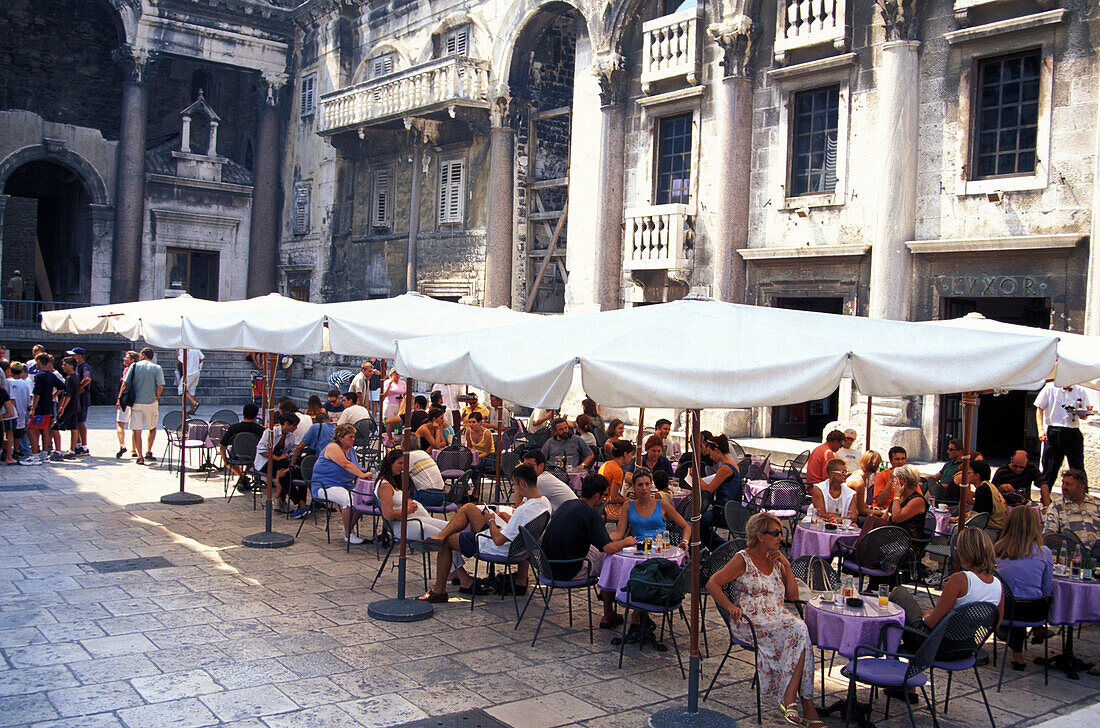 People at street cafe in front of Diokletian Palace, Split, Dalmatia, Croatia, Europe