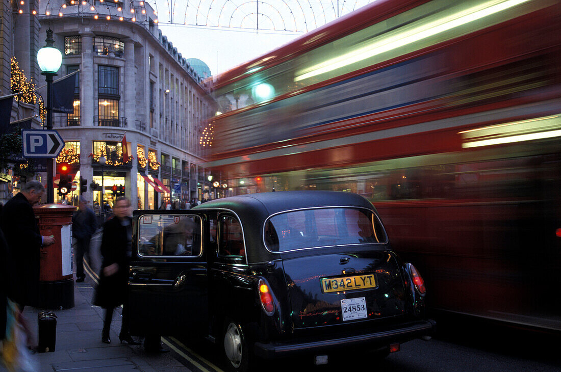 Pedestrians and traffic, Regent Street, London, England