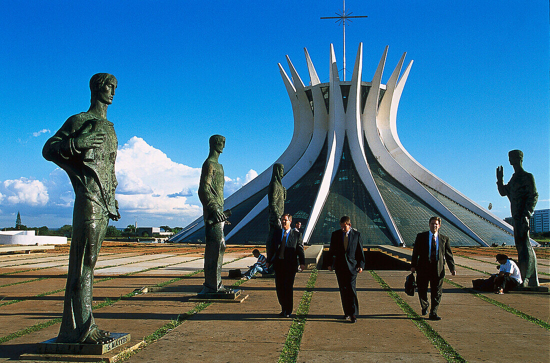 People and statues in front of the Metropolitana Cathedral, Brasilia, Brazil, South America, America