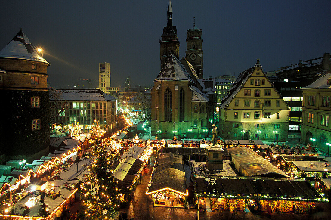 Christmas market and square Karlsplatz with church in the evening, Stuttgart, Baden-Wuerttemberg, Germany, Europe