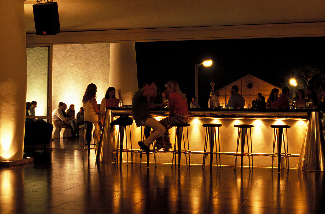 People at the bar of Kapital Disco Club, Lisbon, Portugal, Europe