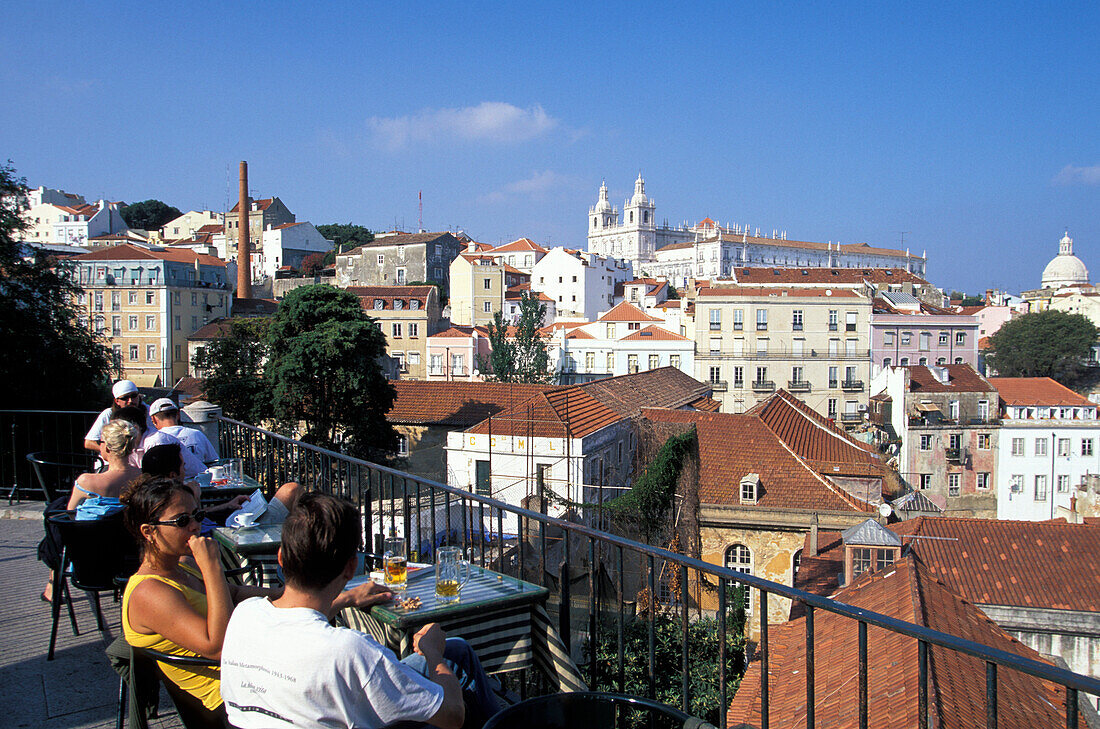 People at the terrace of a cafe, Miradouro Santa Luzia, Alfama, Lisbon, Portugal, Europe