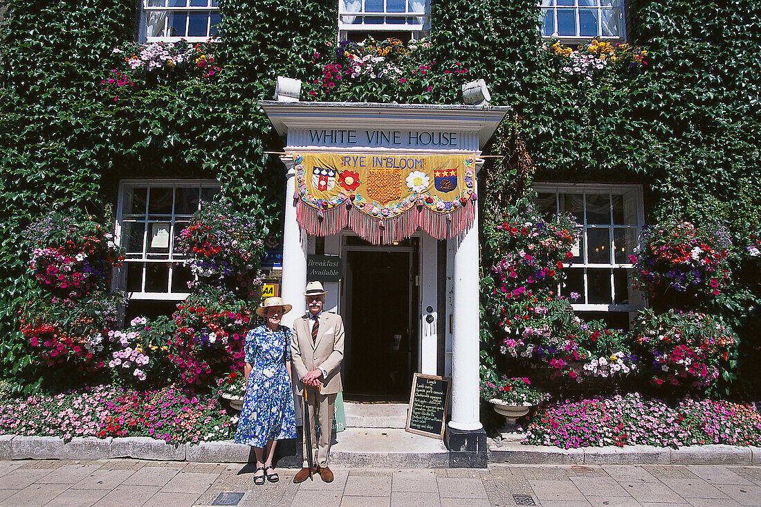 Couple and White Vine House, Rye, East Sussex, England