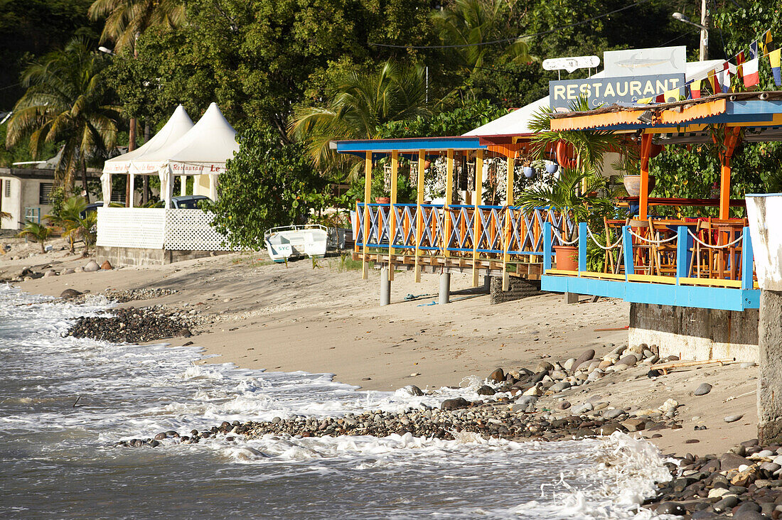 Beach bar and huts on the beach of Deshaies, Basse-Terre, Guadeloupe, Caribbean Sea, America